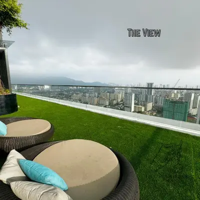 a balcony with a view of a city at Urban Suites 2BR #SelfCheck-in #6Pax #TopFacilities in Jelutong
