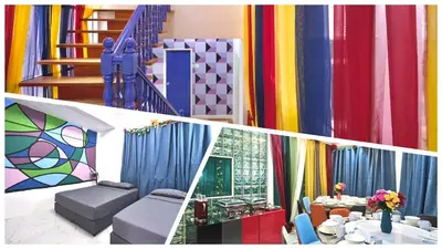 a room filled with colorful curtains and a staircase at Penang Dream Banglo Sleeps 50 in Tanjung Bungah