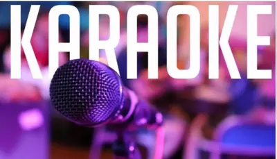 a microphone in front of a sign that reads korea united at Penang Dream Banglo Sleeps 65 in Tanjung Bungah