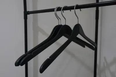 a pair of hangers hanging on a rack at Green Space Homestay Cozy Family(8-12pax) in Ipoh