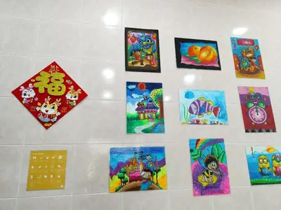 a collage of paintings on a wall at Bidor Family Choice 3 Bedrooms WIFI in Bidur