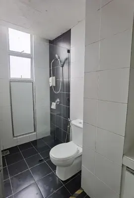 a white bathroom with a toilet and a shower at G Residence - 2BR Family Suite Barrington Night Market - 3 in Brinchang