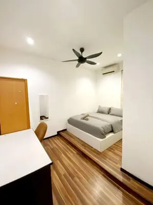 a bedroom with a bed and a ceiling fan at CozyHouse 4ROOM 4BATH ROOM 8PAX@Near BM Icon city in Bukit Mertajam