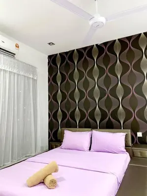 a bedroom with a bed with a teddy bear on it at CozyHouse 4ROOM 4BATH ROOM 8PAX@Near BM Icon city in Bukit Mertajam