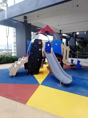 a playground with a slide in a building at The ELM, 2BR Cityview by W. Stay @ Tropicana 218 Macalister in George Town
