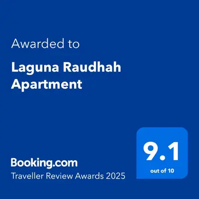 a screenshot of a phone with the text awarded to laguna rakhimov experiment at Laguna Raudhah Apartment in Lumut