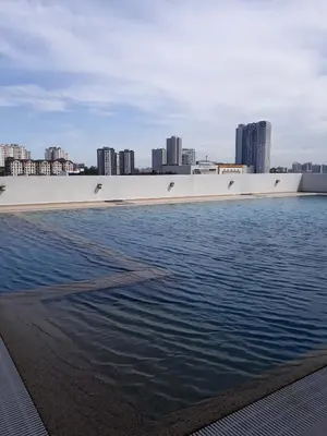 a large body of water with a city in the background at Spacious HOUSE 4R 8pax WiFi-S Pic-Airport in Bayan Lepas