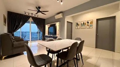 a living room with a dining room table and chairs at Spacious HOUSE 4R 8pax WiFi-S Pic-Airport in Bayan Lepas