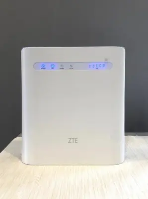 a white nintendo wii controller sitting on a table at Cozy Suite - Near UTAR - Champs Elysees Kampar in Kampar
