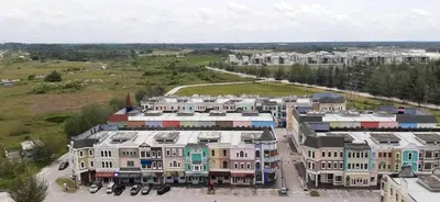 an aerial view of a city with buildings at Cozy Suite - Near UTAR - Champs Elysees Kampar in Kampar