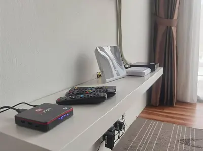 a desk with a keyboard and a computer on it at G Residence - 2BR Family Suite Barrington Night Market - 4 in Brinchang