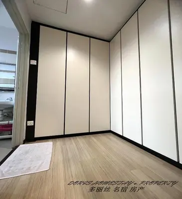 an empty room with white cabinets and a wooden floor at 10pax -2 Storey House Bayu Mutiara at Bukit Mertajam in Bukit Mertajam