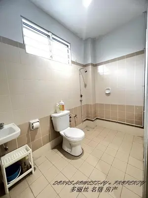 a bathroom with a toilet and a sink at 10pax -2 Storey House Bayu Mutiara at Bukit Mertajam in Bukit Mertajam