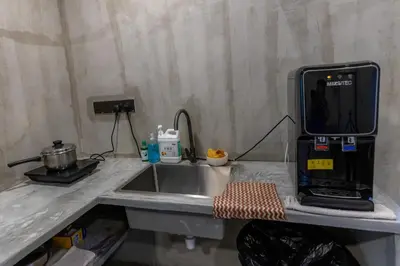 a kitchen counter with a sink and a microwave at -NEW- 22Pax 5R4B V KTV,KID'S POOL,POOL TABLE NEAR USM,LWE HOSPITAL,SPI ARENA in George Town