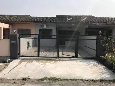 a gate in front of a house at Wi-Fi 100MB Free Ipoh Holiday Suite Taman Anda A5 in Ipoh