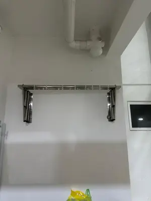 a shelf on the wall in a kitchen at Champs Elysees by Landmark @ Kampar in Kampong Malim Nawar