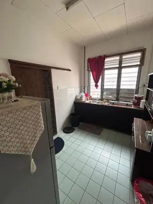 an empty room with a table and a window at Hz Homestay Bertam in Kepala Batas