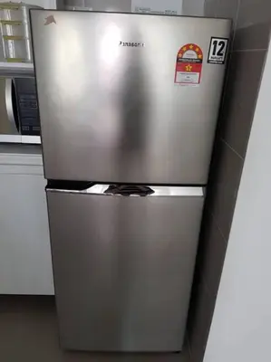 a stainless steel refrigerator in a kitchen at BLUE DOME (Santorini) @ Night Market, Cameron Highlands in Brinchang