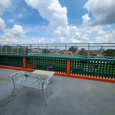 a bench sitting on top of a roof at Ipoh town centre-retro 4pax (studio 6) in Ipoh