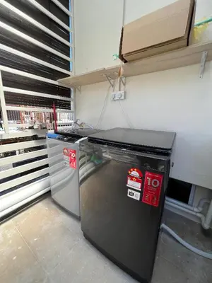 a kitchen with a small refrigerator and a counter at myROOM @ Mandalay Georgetown, Off Jln Burma, Gurney Drive in George Town