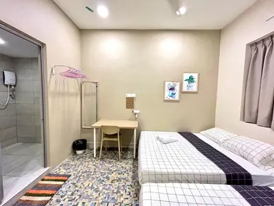 a bedroom with a bed and a desk and a shower at myROOM @ Mandalay Georgetown, Off Jln Burma, Gurney Drive in George Town