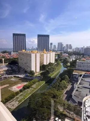 an aerial view of a city with tall buildings at 118 Apartment Tanjung Tokong by Yen's Sojourn in George Town