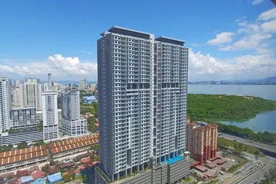an aerial view of a large building in a city at Stylish Urban Suite Penang - with infinite pool in Jelutong