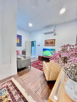 a living room with a couch and a table at Pertak Malai @ Kuala Kubu Bharu in Kuala Kubu Baharu