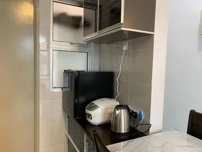 a kitchen counter with a toaster on top of it at Alliv NSF Studio & 1 Bedroom Apartment Stay in Brinchang