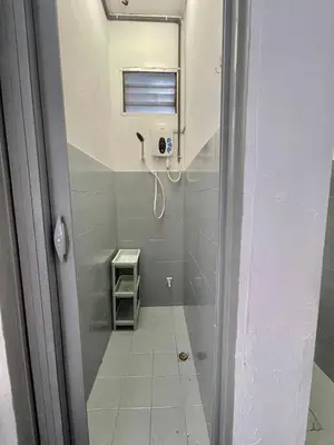 a small bathroom with a shower and a window at Home11A#4pax#Netflix#AlmaBukitMertajam in Bukit Mertajam