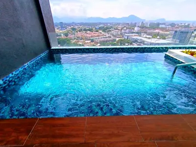 a swimming pool with a view of a city at The Horizon Ipoh 2BR L11 by Grab A Stay in Ipoh