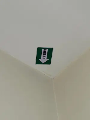 a green and white sign on a ceiling at Cendana House Juru Autocity Bkt Minyak Batu Kawan IKEA in Simpang Ampat