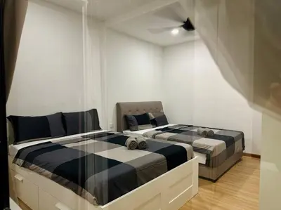 a bedroom with two beds and a couch at (New) Fettes Villa for 20Pax @CentralPenang/Gurney in George Town