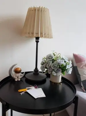 a table with a lamp and a vase of flowers on it at BLUE DOME (Space) @ Night Market, Cameron. 2R2B in Brinchang