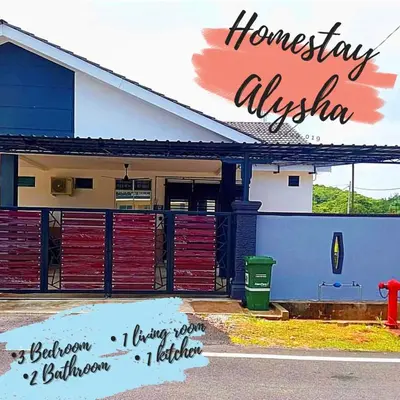 a sign in front of a house with the words honesty adviser at Alysha Homestay in Kuala Lipis