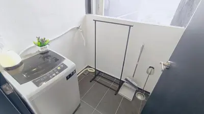 a small bathroom with a shower and a toilet at Infinity Pool, Georgetown, Up to 11 Pax, 2 Bedrooms, 2 Bathrooms, 2 Car Parks by Star Home in Jelutong
