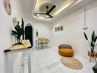 a living room with a ceiling fan and a table at Cozy64#6pax#Netflix#NearAeonAlma#BM#5kmtoIconicPoint in Bukit Mertajam