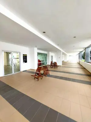 an empty room with chairs and tables in a building at SR28-HousePrivate-3room-BigHouse in Bayan Lepas