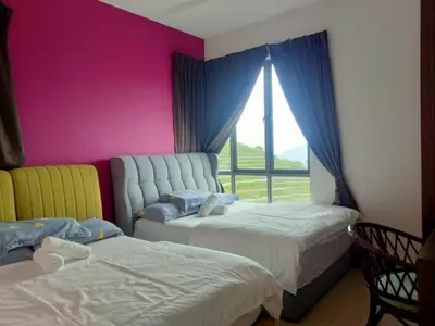 a bedroom with two beds and a large window at Kensington Sunrise sg, Palas Horizon,kea farm in Brinchang