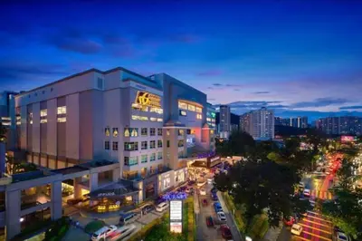 a building in a city at night with traffic at UN1 28 Jazz Massage Chair 5 min GMC Gurney \u5957\u623f in Tanjong Tokong