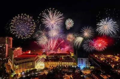 a group of fireworks in the sky over a city at UN1 28 Jazz Massage Chair 5 min GMC Gurney \u5957\u623f in Tanjong Tokong