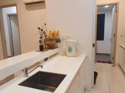 a kitchen with a sink and a counter top at UN1 28 Jazz Massage Chair 5 min GMC Gurney \u5957\u623f in Tanjong Tokong