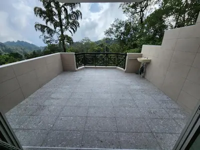 a balcony with a view of a mountain at Little England B8-3 in Bukit Fraser