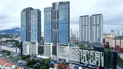 a group of tall buildings in a city at Infinity Pool, Georgetown, Up to 11 Pax, 2 Bedrooms, 2 Bathrooms, 2 Car Parks by Star Home in Jelutong