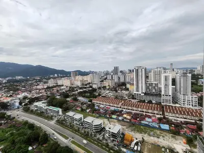 an aerial view of a city with buildings and a highway at Modern Elegance Suite, 5 to 6 pax at Urban Suites Georgetown by SuperStay in Jelutong