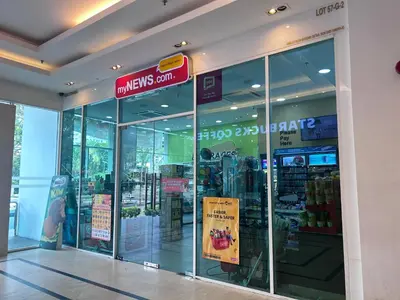 a store with a sign in the front of a store at Seaview Mansion One 2R2B George Town Gleneagles Gurney Komtar by Cozy Cottage Haven in George Town