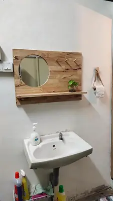 a bathroom sink with a mirror on the wall at Grandpa House \u7237\u7237\u8001\u5bb6 in Gopeng
