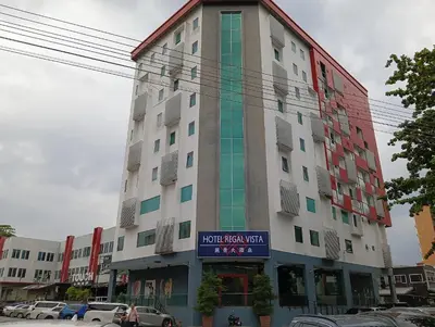a building with a sign on the front of it at Hotel Regal Vista in Ipoh