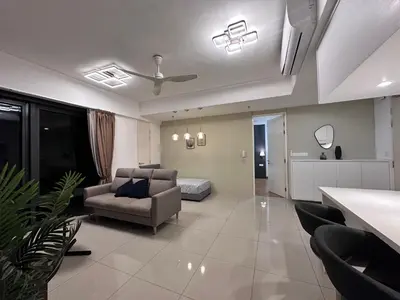 a living room with a couch and a ceiling fan at Tropicana 218 Macalister WL in George Town