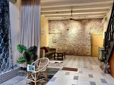 a living room with two chairs and a couch at (New) Eternal Granpa’s heritage(UNESCO)/11pax/3BR in George Town